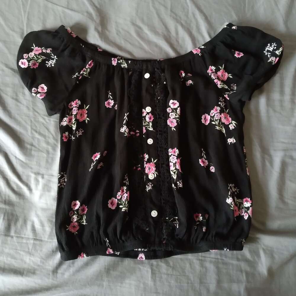 Black off the shoulder floral shirt size small.